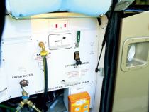 Motorhome fresh water system compartment