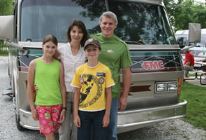 FMC owners Suzanne and Frank Borrmann pose with two of their seven children.