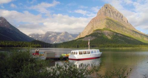 Visitors can choose from various cruises on Glacier National Park's lakes. This boat is docked at Swiftcurrent lake.