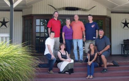 MCD Innovations is a family business, led by Carla and Dave Townsley (standing, middle). Their two sons, two daughters, son-in-law and grandson all hold key positions within the company.