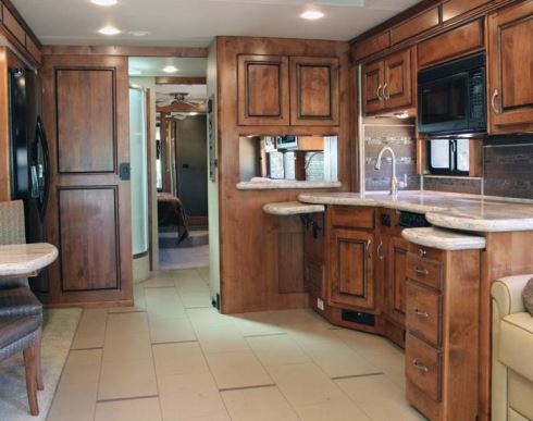 The Knight 40PDQ features glazed cabinetry throughout and ceramic tile from the entryway aft to the bedroom.