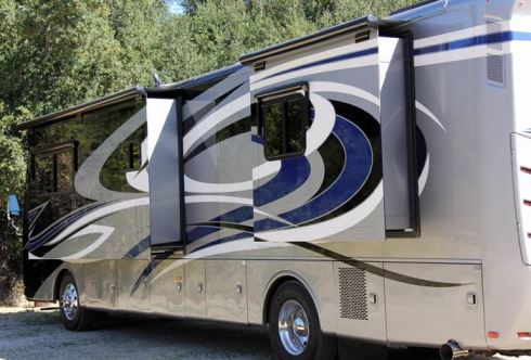 All motorhomes in the Knight body line include full-body paint. The 40PDQ is a quad-slide unit. The other two floor plans come with three slideouts each.