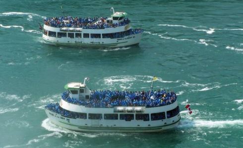 Maid of the Mist VI and VII pass on the Niagara River. Each boat carries approximately 300 passengers.