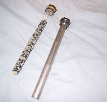 Propane RV water heater components: Deteriorated (left) and new (right) anode rods