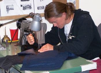 Crew members sew their own jumpsuits, but certified parachute riggers pack their chutes for them.