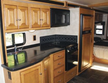 Glazed maple cabinetry graced the galley in the Itasca Sunova test coach, along with the optional three-burner range/oven combo and large-capacity refrigerator with ice maker and water filter.