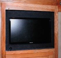 Before: To create more bedroom storage space, this member removed the old analog TV from the 6 cubic foot space.