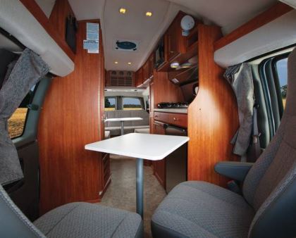 Two tables in the Ranger RT can be set up for dining or relaxing -- one in the front for use with the cockpit seats turned rearward and the other in the back for use with the U-shaped seating area.