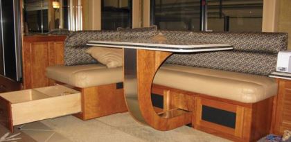 Truline RV craftsmen can create custom interior modifications such as this dinette table and seating.