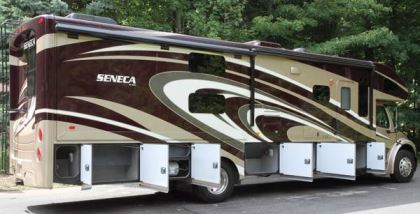 Side-hinged compartment doors provide ready access to the generous storage available in the Jayco Seneca's basement compartments.