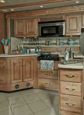 Hardwood cabinetry abounds in the Winnebago Journey 42E's residential-style galley.