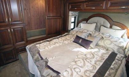Sleeping areas in the Charleston 430BH include a rear king-size bed on the street side.