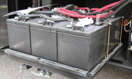 A bank of six chassis batteries resides in a slide-out tray for easy access.
