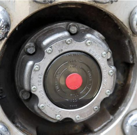 Many diesel pushers have oil bath wheel bearings. The gear lube levels can be inspected via a Stemco hub cover, which has a clear plastic lens and markings for ''full'' and ''add'' levels.