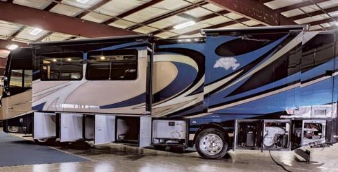 The Nexus Bentley motorhome has large pass-through storage bays made possible by the Freightliner raised-rail chassis.