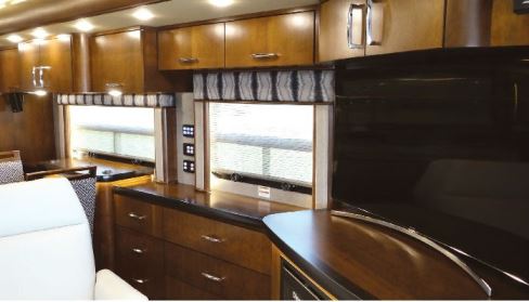 A 30-foot slideout on the road side of the coach contains the television, dining area, and more.