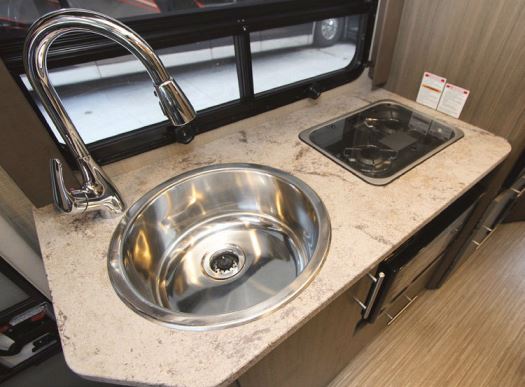 Gemini features include a deep stainless-steel galley sink and a Dometic propane cooktop.