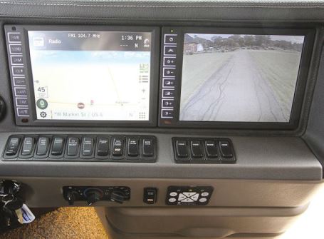 A monitor for the exterior cameras resides next to the dash radio and navigation system.
