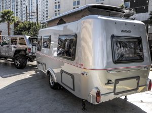 A pop-top roof is a distinctive feature of the Hymer Touring GT, an ultra-lightweight travel trailer.