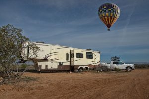 A hot-air balloon paid an early-morning visit to the Braga family's boondocking spot near Cottonwood, Arizona.