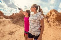 Social media helps us to share our travel adventures with friends and family back home.