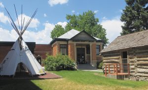 An original 1916 log cabin and a reproduced American Indian tipi are part of the Jim Gatchell Memorial Museum.