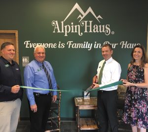 Alpin Haus representatives officially open the expanded RV sales facility in Saratoga County, New York.