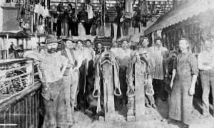 Visitors to the J.M. Capriola Co. mercantile can see this photo (which depicts saddle and harness makers), among other historical items.