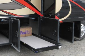 Basement storage is plentiful. An optional cargo slide tray is placed in one of the pass-through bays.