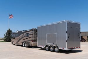 Enclosed trailers, such as Featherlite Trailers' Model 4926, pictured here, do a good job of protecting vehicles from the elements.