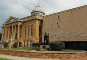 The Oklahoma Territorial Museum is known for its statues of Mr. Oklahoma and Miss Indian Territory.