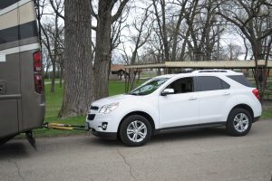 This towed vehicle is ready to be flat towed after being equipped with the Dominator, a lightweight steel and aluminum tow bar from Demco. It is rated at 7,500 pounds.