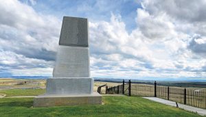 A memorial to the 7th U.S. Cavalry is engraved with soldiers’ names, and rests atop Last Stand Hill at Little Bighorn Battlefield National Monument.
