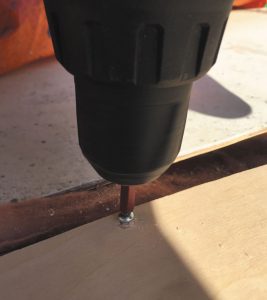 Secure the replacement substrate to the roof with screws, making sure the heads are flush with the surface or slightly below.