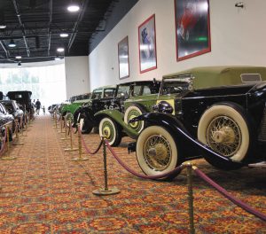 An entire row of Rolls-Royces captures visitors’ admiration.