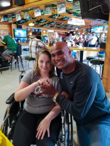 Champions Riverside Resort in Galesville, Wisconsin, regularly hosts fundraising events for the Gilbert Brown Foundation. Here, former Green Bay Packer Eugene Robinson spends time with a young guest.