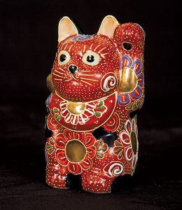 Displays at the CFA Foundation Feline Historical Museum include a collection of maneki-neko, Japanese lucky cats.