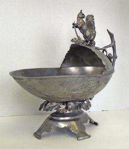 Displays at the CFA Foundation Feline Historical Museum include fancy trophies, such as this 1883 nut bowl