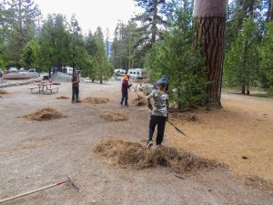 Young volunteers with Youth For Christ California spend a spring-cleanup day at Wishon Village RV Resort. In return, the RV park makes a donation to the organization, which assists troubled teens.