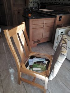Creating storage in an RV dinette chair