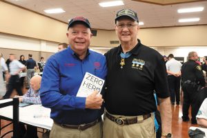 FMCA president Jon Walker (left) met U.S. Medal of Honor recipient Allen J. Lynch.