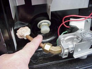 The drain plug on an Atwood water heater.