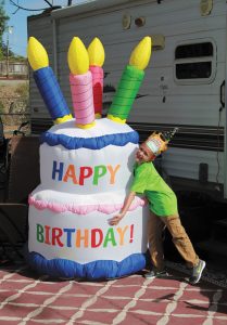 Linda Ruiz surprised her grandson Chase with an inflatable cake when the family celebrated his 8th birthday while camping in Carpinteria, California.
