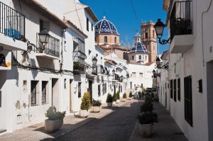 RVing tourists in Altea, Spain, can view the town's blue-domed cathedral, seen here from the cobblestone streets.