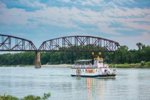A riverboat named after Lewis and Clark plies the Missouri River from a dock at Bismarck.