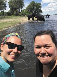 Bob Lucky’s daughter, Lauren Lucky-King (left), shared a memorable wildlife moment with friend Katie Bay during a Harding University mission trip to Zambia. 
