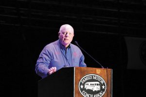 FMCA national president Jon Walker addresses the FMCA crowd prior to evening entertainment at the March 2019 convention in Perry, Georgia.