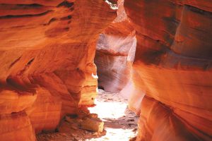 The aptly named Peek-A-Boo Slot Canyon, in Kanab, Utah, depicted in this view shared by Karl and Yong Pflaume, is also known as the Red Canyon.