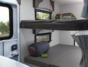 The Lance Camper 2445 travel trailer comes equipped with double-size bunk beds.