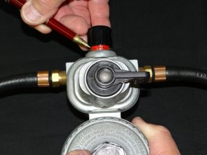 A typical propane twin-cylinder automatic changeover mechanism.